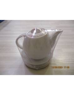 Théière en porcelaine + 5 assiettes à café